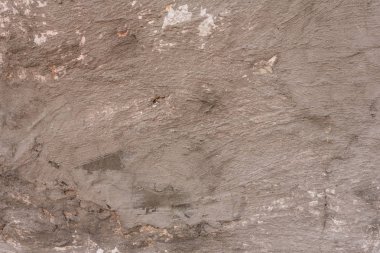 Çizikler ve çatlaklar ile duvar parçası. Arka plan olarak kullanılabilir