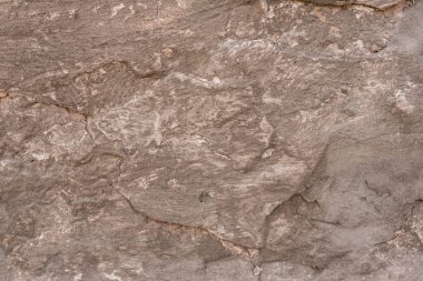 Çizikler ve çatlaklar ile duvar parçası. Arka plan olarak kullanılabilir