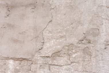 Çizikler ve çatlaklar ile duvar parçası. Arka plan olarak kullanılabilir