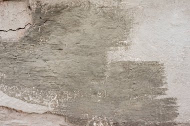 Çizikler ve çatlaklar ile duvar parçası. Arka plan olarak kullanılabilir