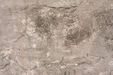 Çizikler ve çatlaklar ile duvar parçası. Arka plan olarak kullanılabilir