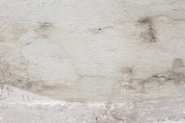 Çizikler ve çatlaklar ile duvar parçası. Arka plan olarak kullanılabilir