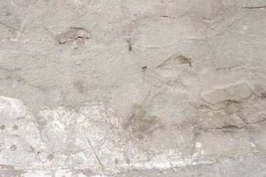 Çizikler ve çatlaklar ile duvar parçası. Arka plan olarak kullanılabilir