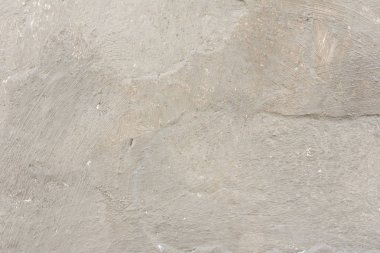 Çizikler ve çatlaklar ile duvar parçası. Arka plan olarak kullanılabilir