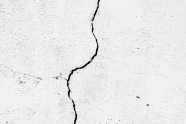 Doku, duvar, beton, arka plan olarak kullanılabilir. Çizik ve çatlaklarla dolu bir duvar parçası.