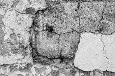 Doku, duvar, beton, arka plan olarak kullanılabilir. Çizik ve çatlaklarla dolu bir duvar parçası.