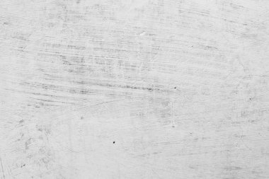 Doku, duvar, beton, arka plan olarak kullanılabilir. Çizik ve çatlaklarla dolu bir duvar parçası.