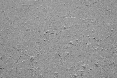 Doku, duvar, beton, arka plan olarak kullanılabilir. Çizik ve çatlaklarla dolu bir duvar parçası.