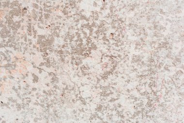 Doku, duvar, beton, arka plan olarak kullanılabilir. Çizik ve çatlaklarla dolu bir duvar parçası.