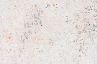 Doku, duvar, beton, arka plan olarak kullanılabilir. Çizik ve çatlaklarla dolu bir duvar parçası.