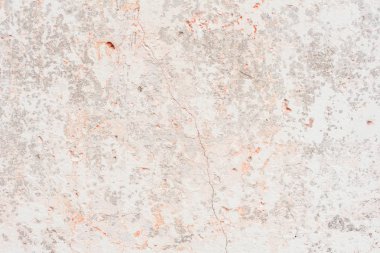 Doku, duvar, beton, arka plan olarak kullanılabilir. Çizik ve çatlaklarla dolu bir duvar parçası.