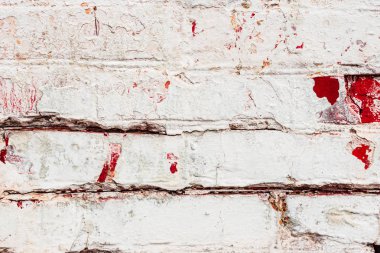 Doku, duvar, beton, arka plan olarak kullanılabilir. Çizik ve çatlaklarla dolu bir duvar parçası.