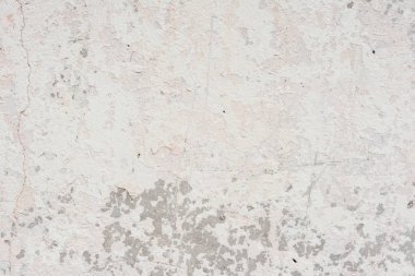 Doku, duvar, beton, arka plan olarak kullanılabilir. Çizik ve çatlaklarla dolu bir duvar parçası.