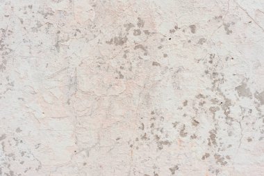 Doku, duvar, beton, arka plan olarak kullanılabilir. Çizik ve çatlaklarla dolu bir duvar parçası.