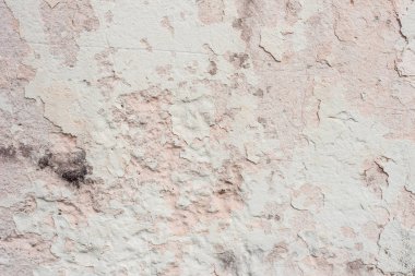 Doku, duvar, beton, arka plan olarak kullanılabilir. Çizik ve çatlaklarla dolu bir duvar parçası.