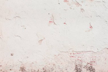 Doku, duvar, beton, arka plan olarak kullanılabilir. Çizik ve çatlaklarla dolu bir duvar parçası.