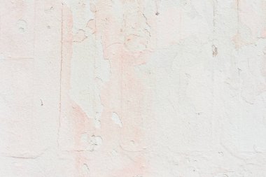 Doku, duvar, beton, arka plan olarak kullanılabilir. Çizik ve çatlaklarla dolu bir duvar parçası.