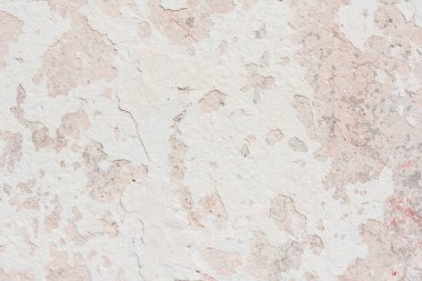 Doku, duvar, beton, arka plan olarak kullanılabilir. Çizik ve çatlaklarla dolu bir duvar parçası.