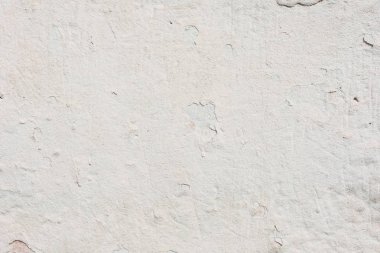 Doku, duvar, beton, arka plan olarak kullanılabilir. Çizik ve çatlaklarla dolu bir duvar parçası.