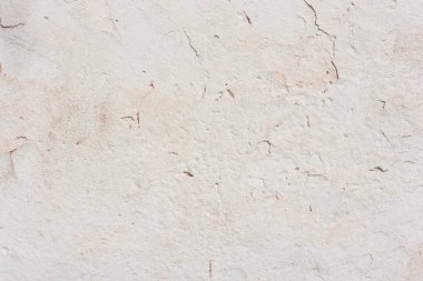 Doku, duvar, beton, arka plan olarak kullanılabilir. Çizik ve çatlaklarla dolu bir duvar parçası.