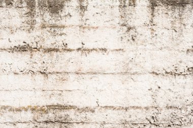 Doku, duvar, beton, arka plan olarak kullanılabilir. Çizik ve çatlaklarla dolu bir duvar parçası.