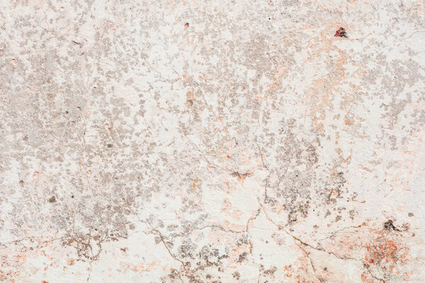 Текстура, стена, бетон, его можно использовать в качестве фона. Фрагмент стены с царапинами и трещинами