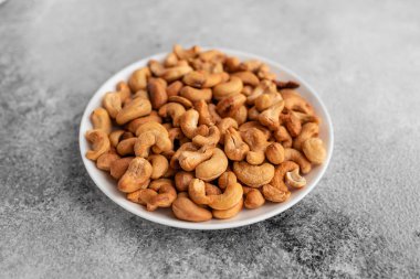 Kaju fıstığı kapatın. Kahvaltı, sağlıklı gıda. Arka plan olarak kullanılabilir