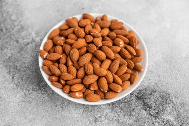 Badem fındık kapatın. Kahvaltı, sağlıklı gıda. Arka plan olarak kullanılabilir