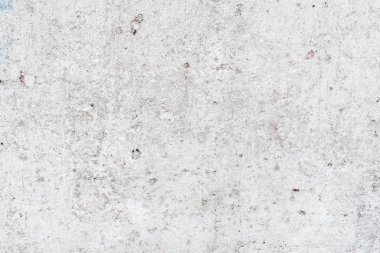 Çizik ve çatlaklarla dolu bir duvar parçası.