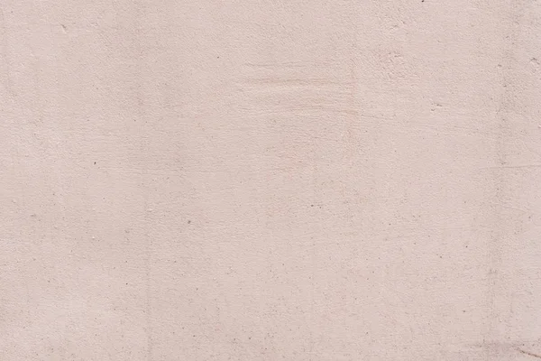 Çizik ve çatlaklarla dolu bir duvar parçası.