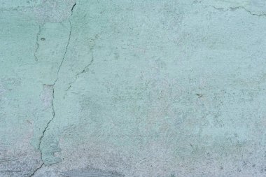 Doku, duvar, beton, arka plan olarak kullanılabilir. Çizik ve çatlaklarla dolu bir duvar parçası.