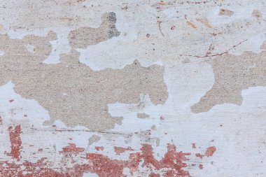 Doku, duvar, beton, arka plan olarak kullanılabilir. Çizik ve çatlaklarla dolu bir duvar parçası.