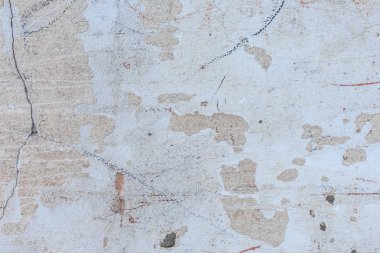 Doku, duvar, beton, arka plan olarak kullanılabilir. Çizik ve çatlaklarla dolu bir duvar parçası.