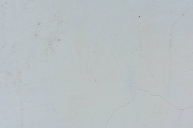 Doku, duvar, beton, arka plan olarak kullanılabilir. Çizik ve çatlaklarla dolu bir duvar parçası.