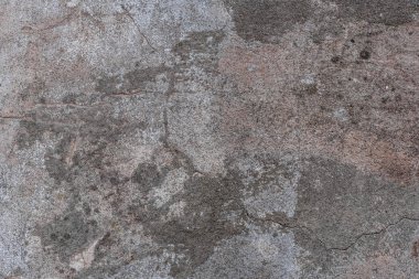 Doku, duvar, beton, arka plan olarak kullanılabilir. Çizik ve çatlaklarla dolu bir duvar parçası.