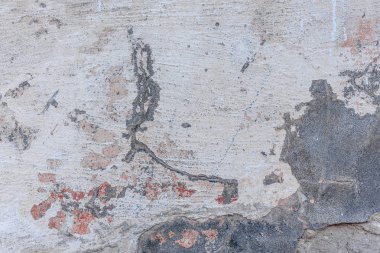 Doku, duvar, beton, arka plan olarak kullanılabilir. Çizik ve çatlaklarla dolu bir duvar parçası.