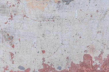 Doku, duvar, beton, arka plan olarak kullanılabilir. Çizik ve çatlaklarla dolu bir duvar parçası.