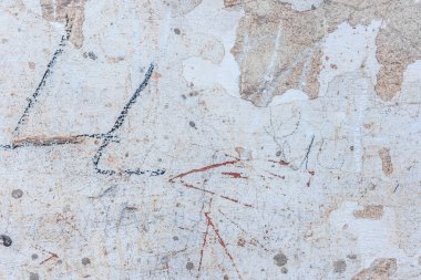 Doku, duvar, beton, arka plan olarak kullanılabilir. Çizik ve çatlaklarla dolu bir duvar parçası.