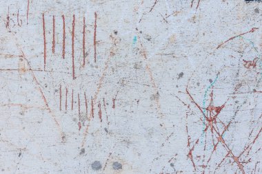 Doku, duvar, beton, arka plan olarak kullanılabilir. Çizik ve çatlaklarla dolu bir duvar parçası.