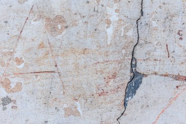 Doku, duvar, beton, arka plan olarak kullanılabilir. Çizik ve çatlaklarla dolu bir duvar parçası.