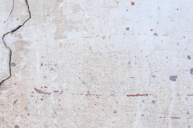 Doku, duvar, beton, arka plan olarak kullanılabilir. Çizik ve çatlaklarla dolu bir duvar parçası.