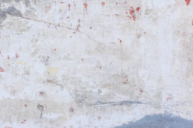 Doku, duvar, beton, arka plan olarak kullanılabilir. Çizik ve çatlaklarla dolu bir duvar parçası.