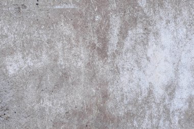 Doku, duvar, beton, arka plan olarak kullanılabilir. Çizik ve çatlaklarla dolu bir duvar parçası.