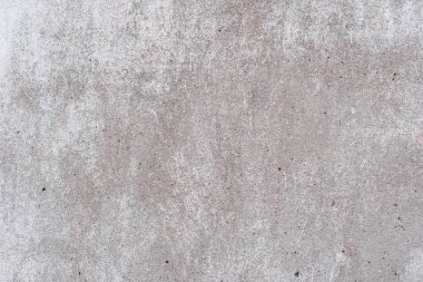 Doku, duvar, beton, arka plan olarak kullanılabilir. Çizik ve çatlaklarla dolu bir duvar parçası.