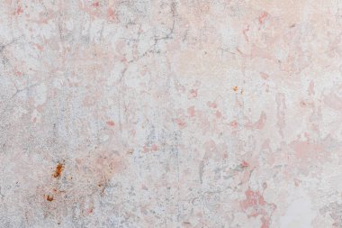 Doku, duvar, beton, arka plan olarak kullanılabilir. Çizik ve çatlaklarla dolu bir duvar parçası.