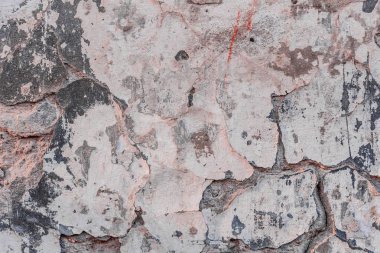 Doku, duvar, beton, arka plan olarak kullanılabilir. Çizik ve çatlaklarla dolu bir duvar parçası.