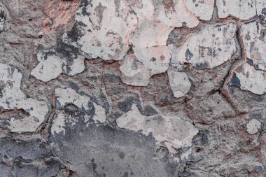 Doku, duvar, beton, arka plan olarak kullanılabilir. Çizik ve çatlaklarla dolu bir duvar parçası.