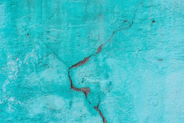 Doku, duvar, beton, arka plan olarak kullanılabilir. Çizik ve çatlaklarla dolu bir duvar parçası.