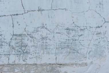 Doku, duvar, beton, arka plan olarak kullanılabilir. Çizik ve çatlaklarla dolu bir duvar parçası.