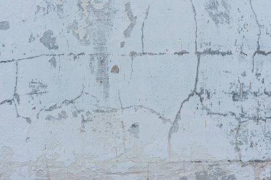 Doku, duvar, beton, arka plan olarak kullanılabilir. Çizik ve çatlaklarla dolu bir duvar parçası.